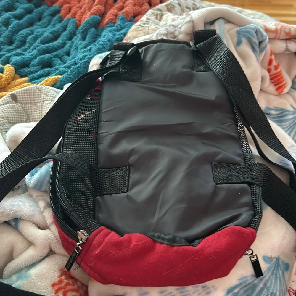 My dog has outgrown this little doggy backpack, but it’s very beautiful.